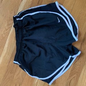 Black Nike running shorts